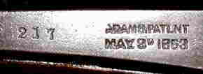 SERIAL NUMBER "217" PLUS "ADAMS.PATLNT" (PATENT) MAY. 3D  1858"�LEFT FRONT LOWER FRAME