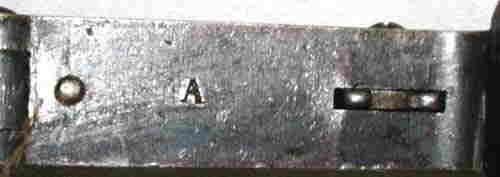 "A" On Inside Of Frame Under The Cylinder